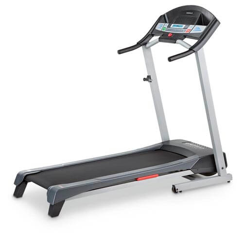 Silver and black Weslo Cadence G 5.9 folding treadmill viewed from the side, showing the angled console, the walking belt and the red safety key on the deck