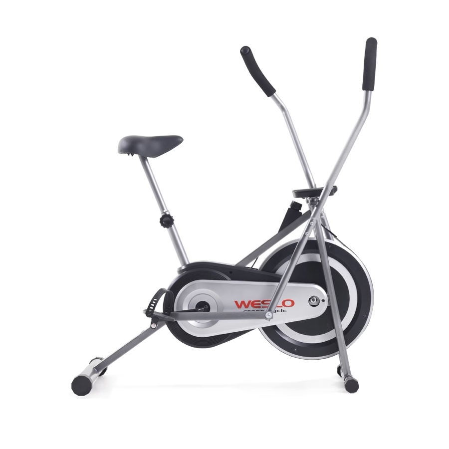 Weslo Cross Cycle upright exercise bike with a silver frame, moving handlebars, padded seat on an adjustable post, pedal straps and a black flywheel behind the WESLO chain guard